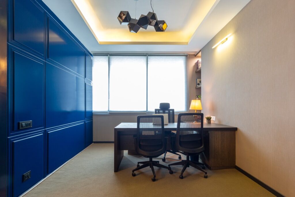 Office Cabin Decor with pop of Royal Blue and Cozy Lightings