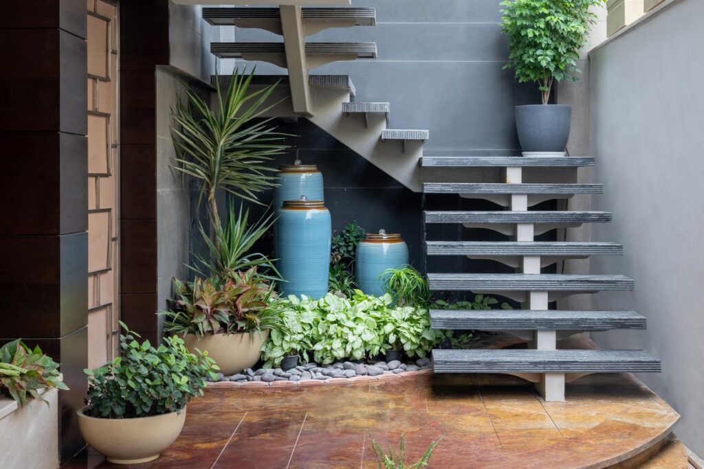 Biophilic Entrance to the House with Staircase Traversing the entire House, Gatsby