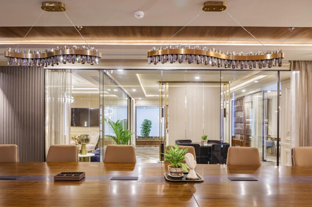 Contemporary Conference Room Design with Wooden Ceiling and unique curved Chandeliers