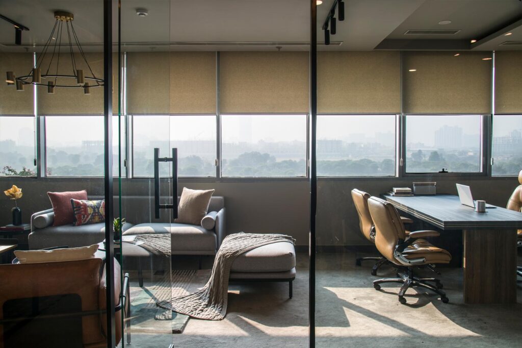 Modern Office Interiors with Glass Partitions and Grey Textures Walls