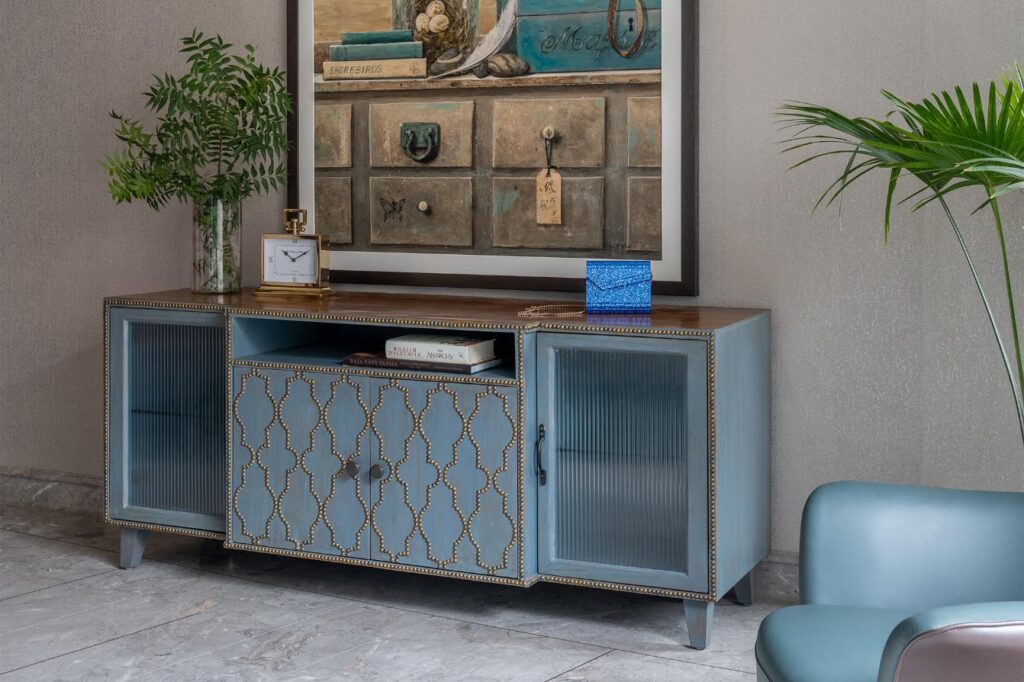 Sea blue Wooden Side Table with Golden Accents and Griege Walls