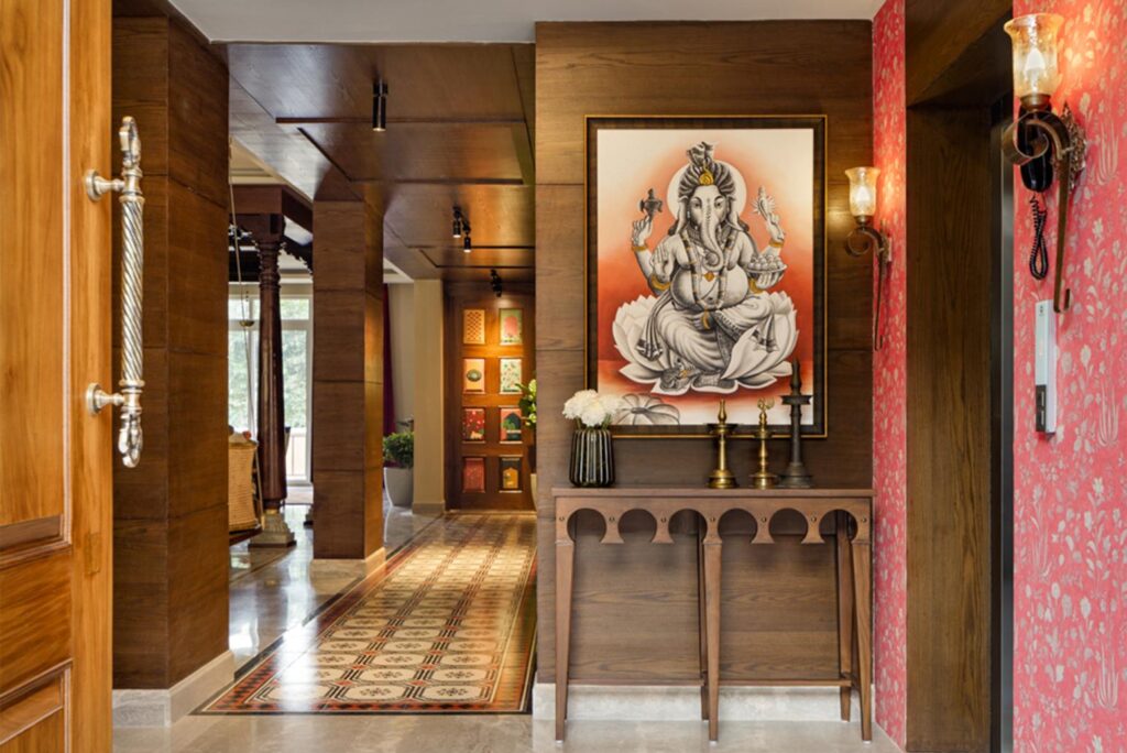 South Indian Home Interior Design with Wooden Wall Panels and Ganesha Art work at the entrance, Marbella