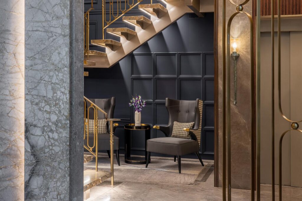 Statement Luxury Staircase with Golden Accents, Gatsby